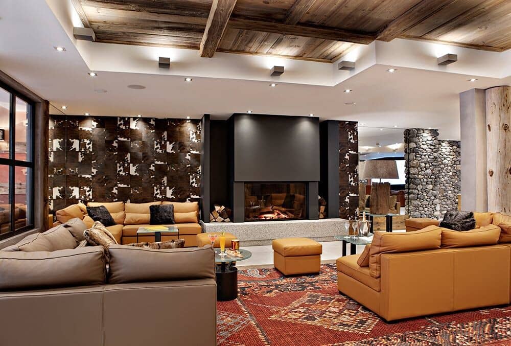 Living area with wood-burning fireplace and seating for 12