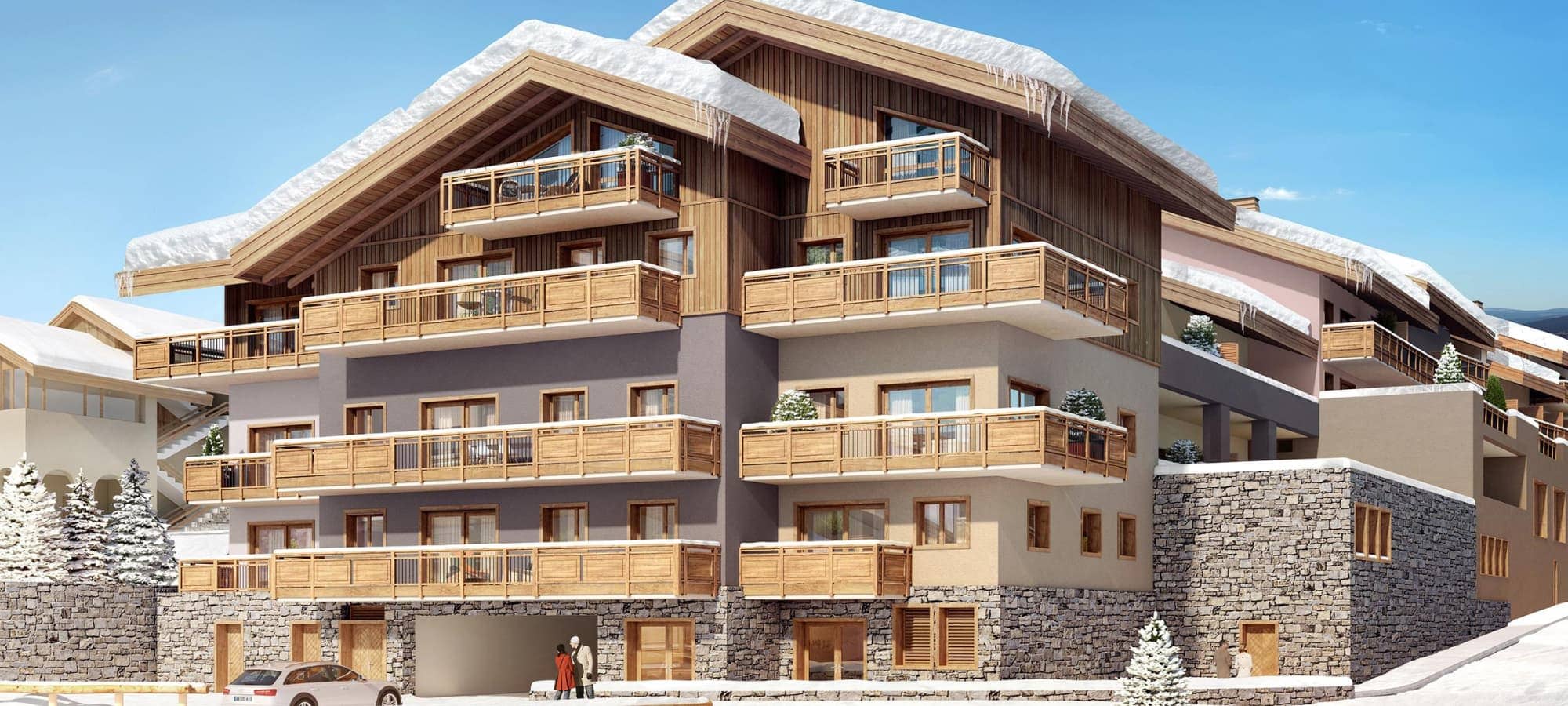 Ski-in/ski-out chalet exterior with private balconies and underground parking access