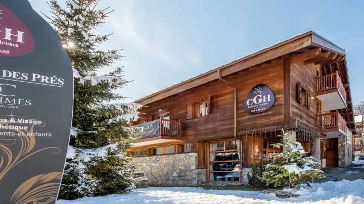 Timber residence exterior featuring private balconies and on-site spa facilities