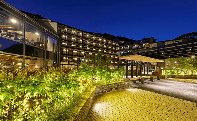 Building exterior with heated courtyard and covered drop-off area