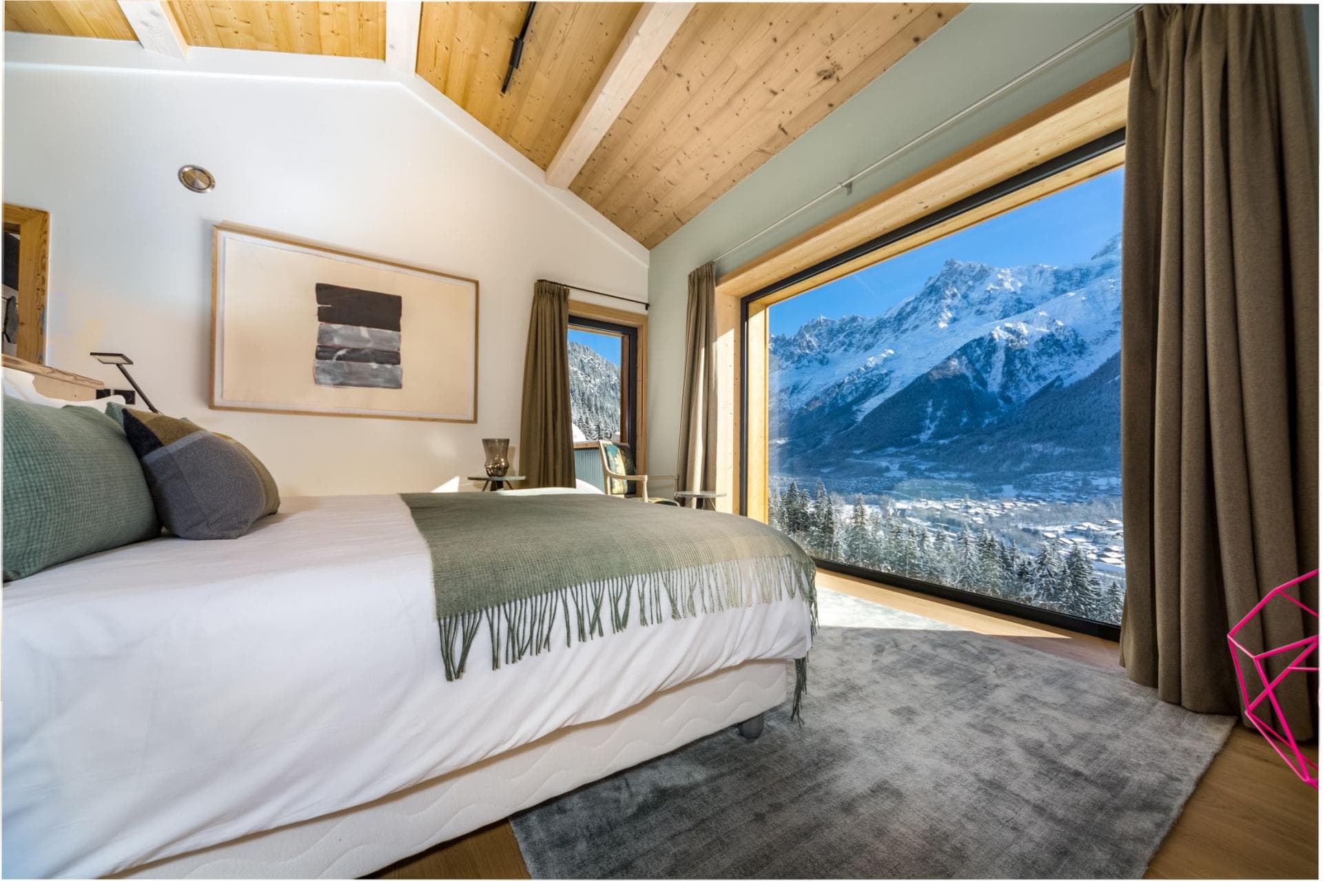 Primary bedroom with king bed and panoramic Mont Blanc views