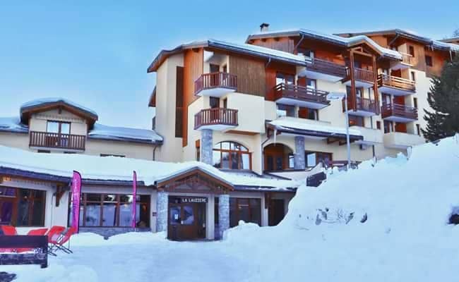 Ski-in/ski-out lodge exterior with private balconies and direct slope access