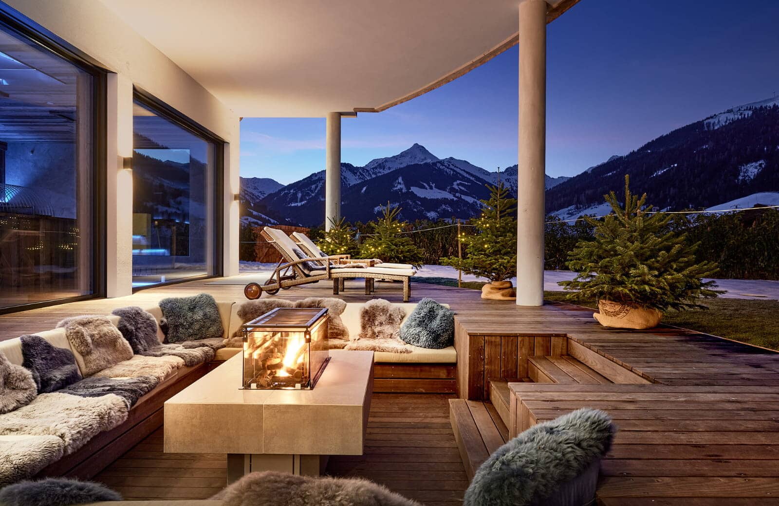 Covered deck with fire pit table and mountain views