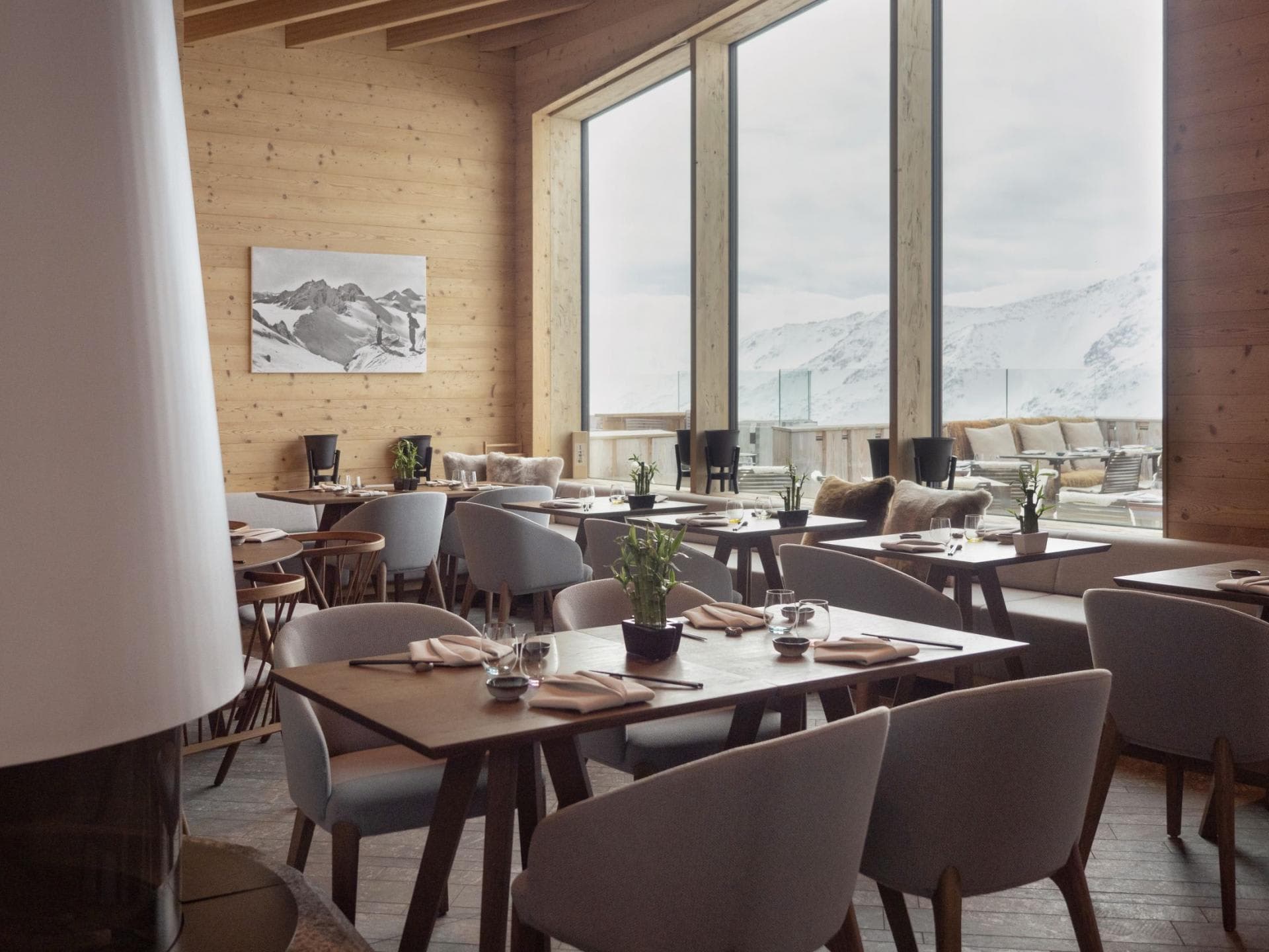Dining area with panoramic mountain views and terrace access