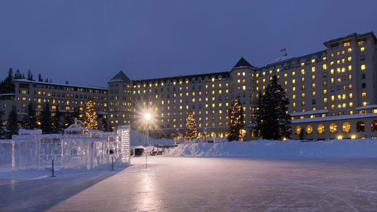 Hotel exterior with outdoor skating rink and seasonal ice sculptures