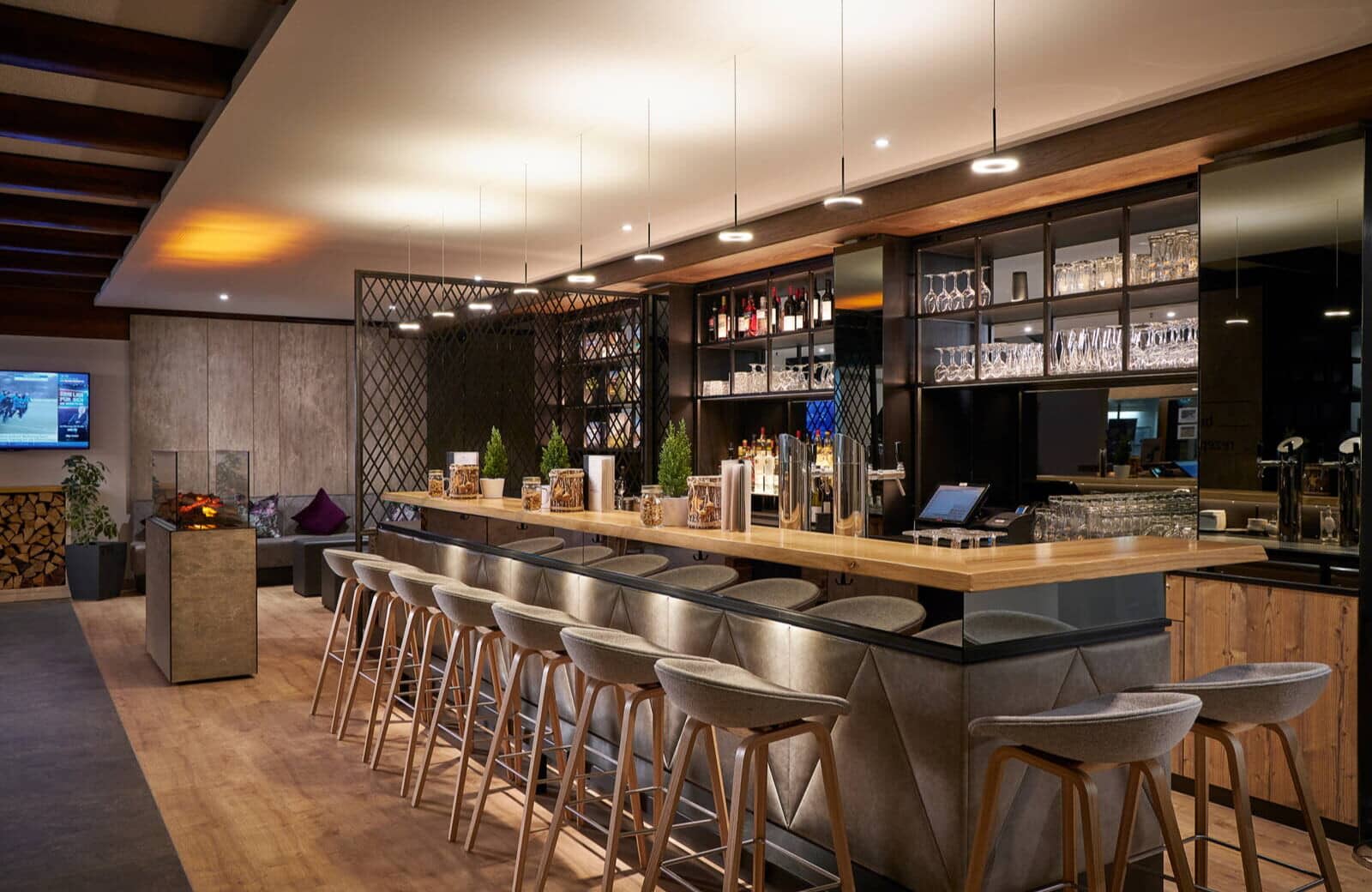 Bar seating for 10 with built-in wine storage and beer taps