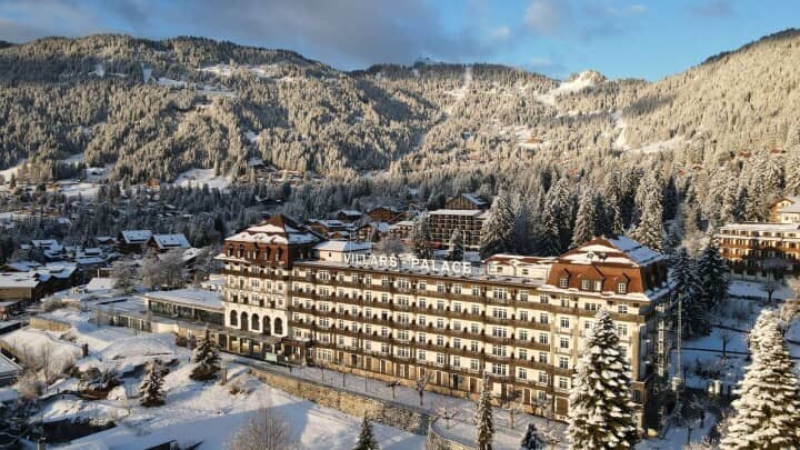 Villars Palace hotel exterior with mountain views and direct village access