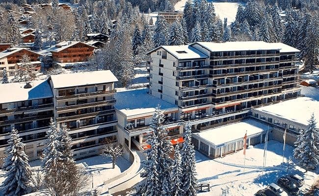 Aerial view of apartment complex with private balconies and ski-in/ski-out access